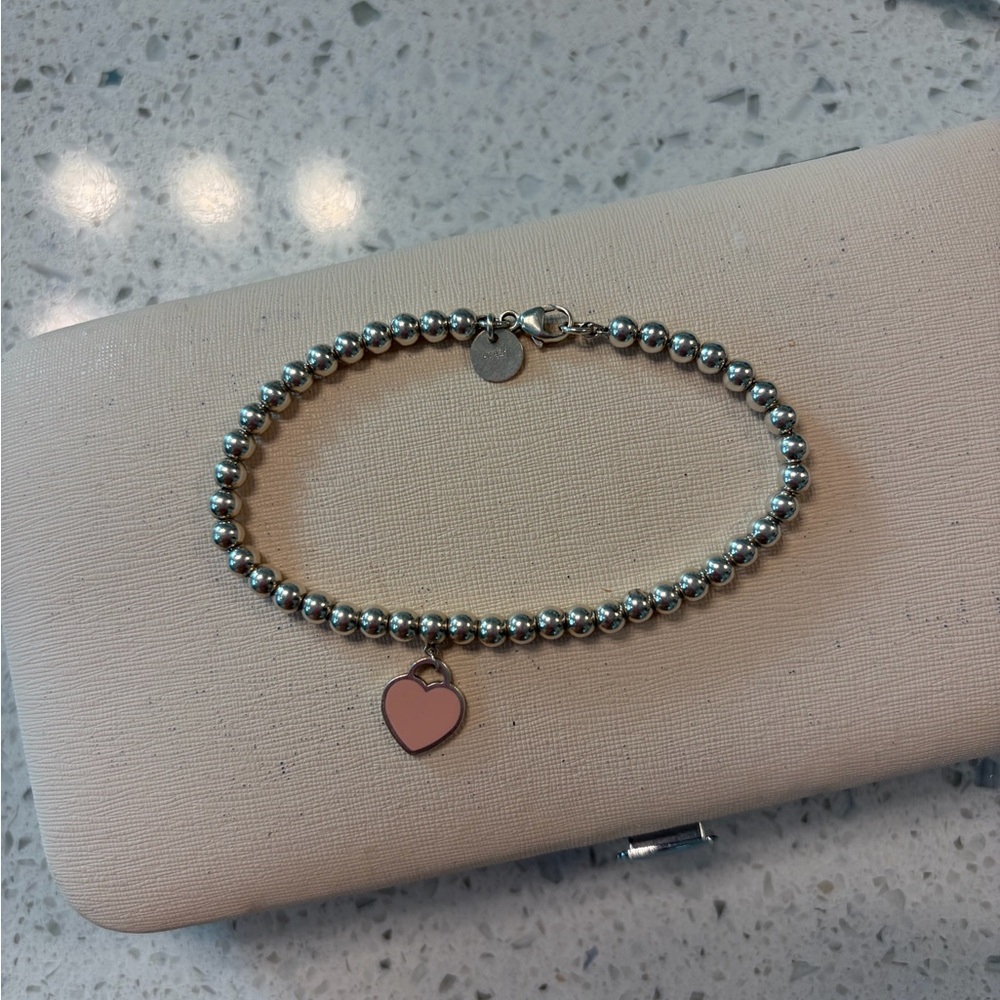 Tiffany & Co. Silver Bracelet with Pink Heart Charm